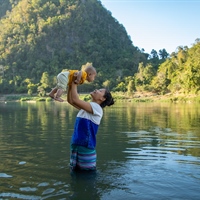 Motherhood around the world as seen through the lens of nine female humanitarian photographers.
