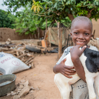 Twelve heart-melting pictures of kids with their animal buddies