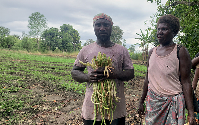 Farmers showing their production (long beans) during our visit to their farm
